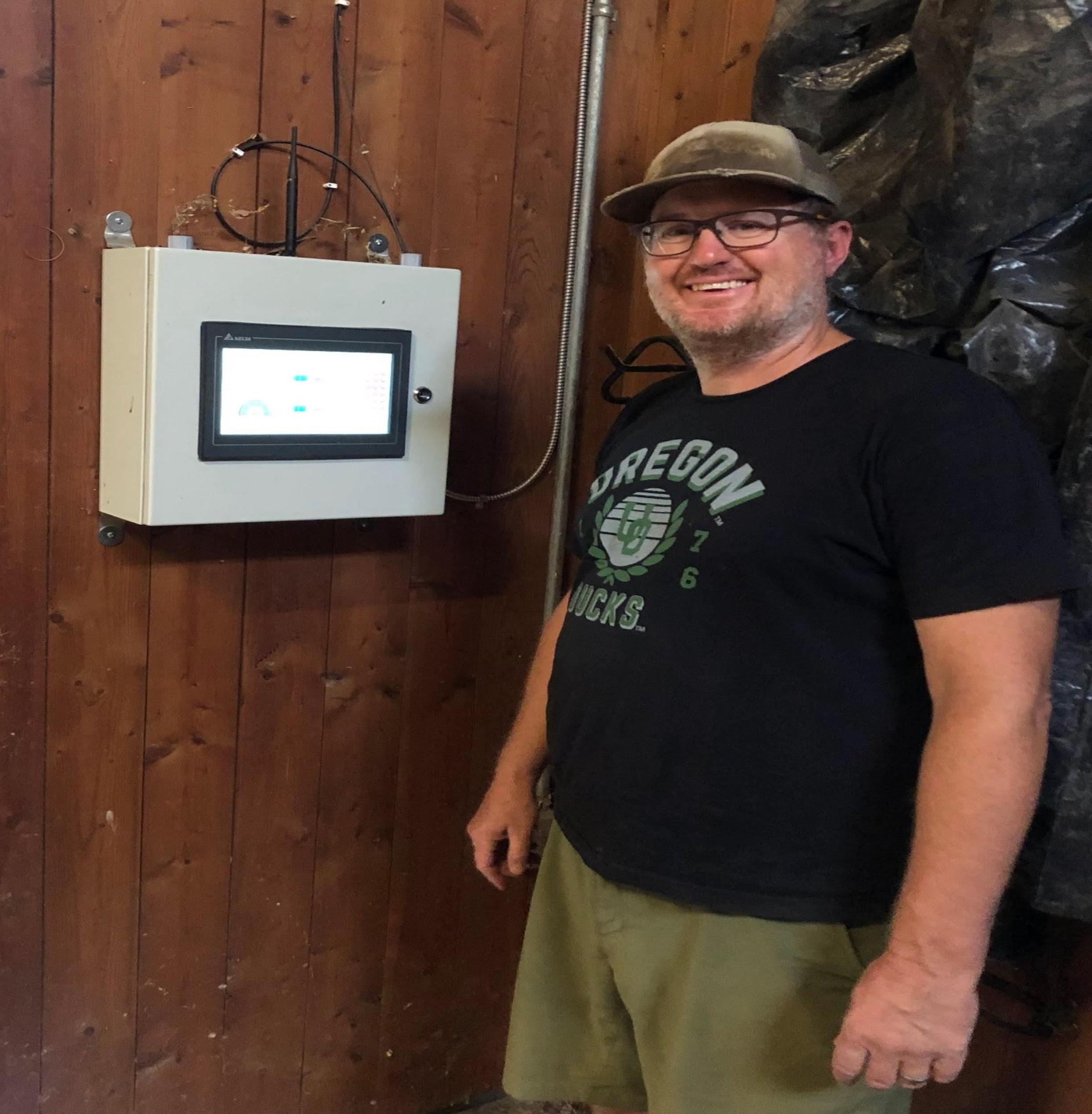 Chris standing next to Gateway